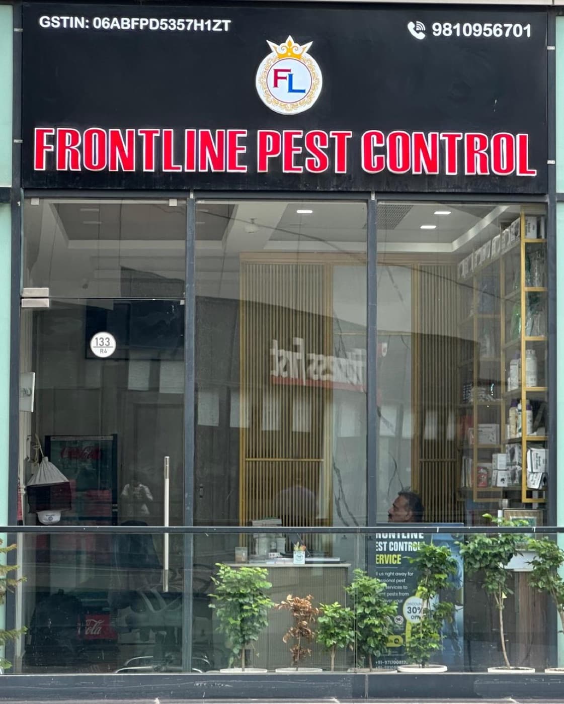 Frontline Pest Control branded signage